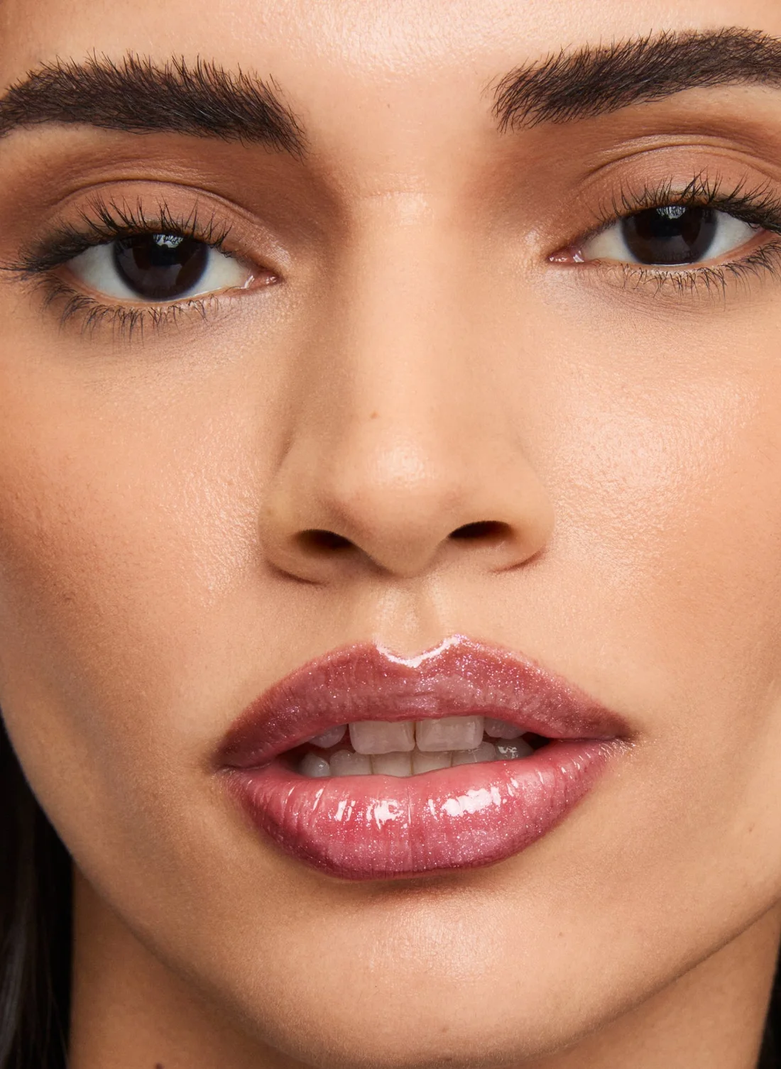Model wearing POV Beauty Contour It and Amp It lip colour